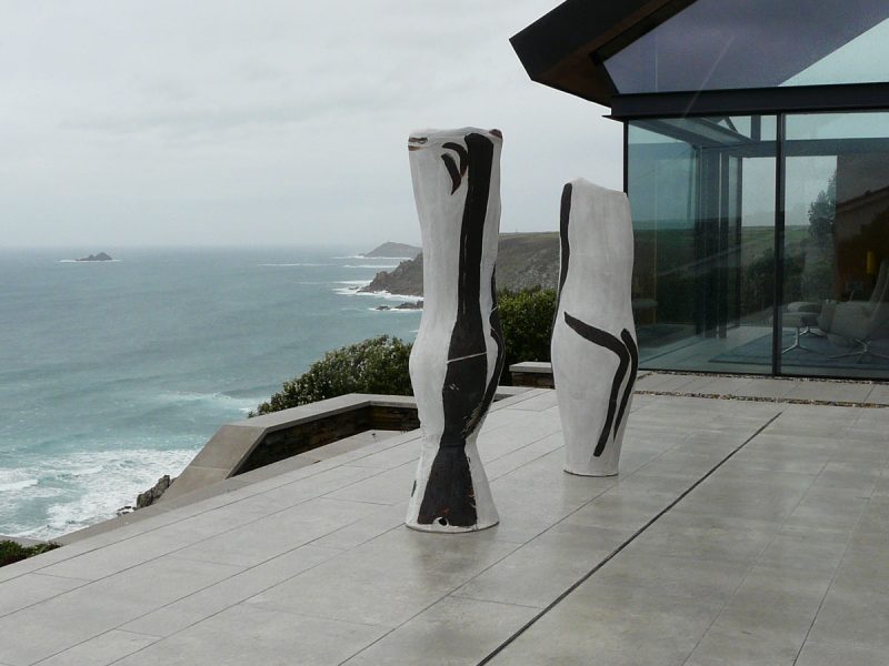 Two pieces of Tony Lattimer's work photographed overlooking the sea above Sennen, Cornwall