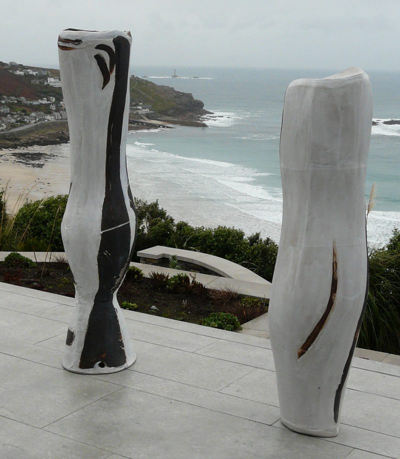 Two pieces of Tony Lattimer's work photographed overlooking the sea above Sennen, Cornwall